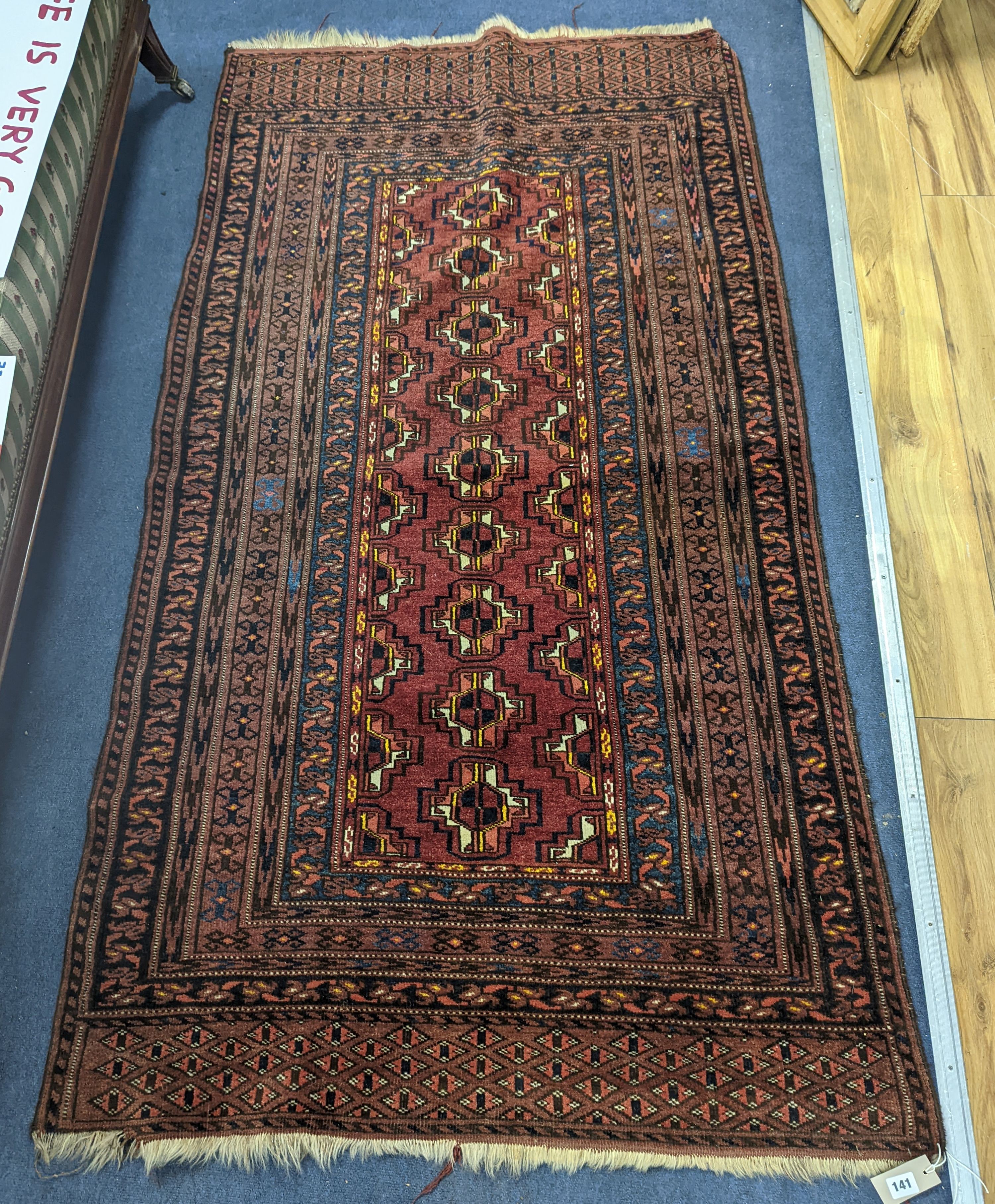 A Bokhara Turkoman geometric rug, 200 x 110cm